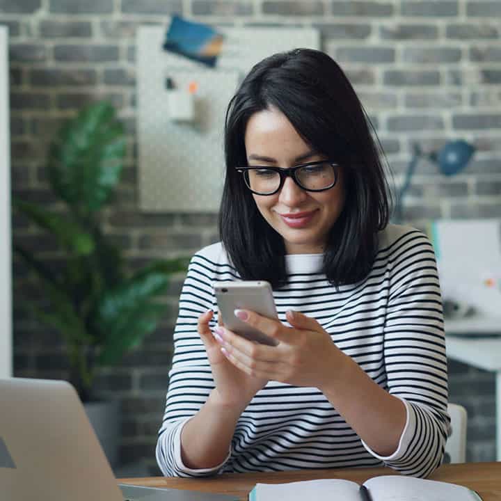 a person interacting with their smartphone